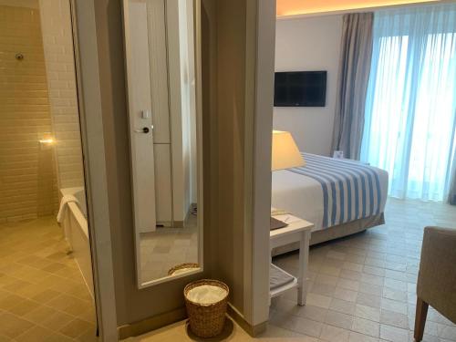Кровать или кровати в номере Hotel Playa Sol