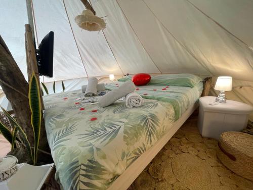 a bedroom with a bed in a tent at Re dream suite a tema - Rapallo in Rapallo