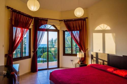 Ένα ή περισσότερα κρεβάτια σε δωμάτιο στο GEORGIA BEACH VILLA