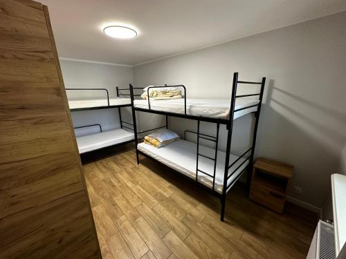 Postel nebo postele na pokoji v ubytování Dom Gościnny u Pierwienieckich
