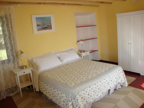 Ένα ή περισσότερα κρεβάτια σε δωμάτιο στο Residenza Erbaluna