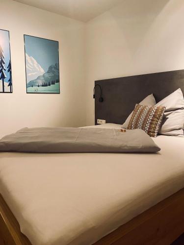 Alpenchalet zurHinterochsenweide SKI IN & SKI OUTにあるベッド