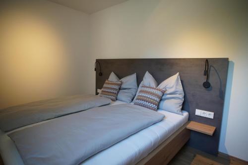 Alpenchalet zurHinterochsenweide SKI IN & SKI OUTにあるベッド