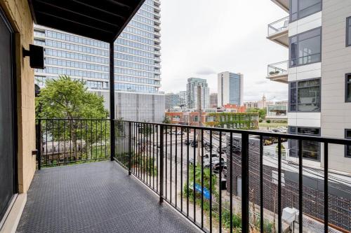 a balcony with a view of the city at Cozy Beautiful Downtown Unit CHI in Prime River North Location near Mag Mile - 2 in Chicago