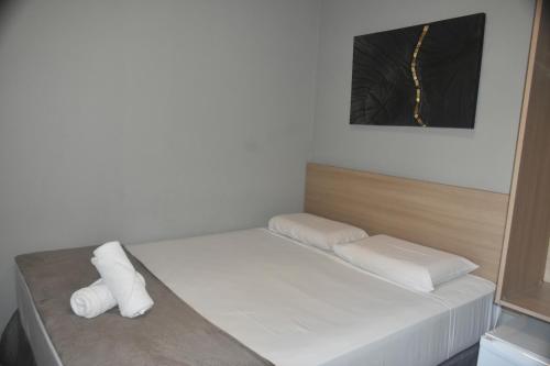 Letto o letti in una camera di Unity Hotel - Votorantim - SP
