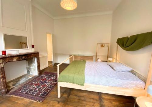 Postel nebo postele na pokoji v ubytování Le Cordeliers #18 - Poitiers - LaConciergerie