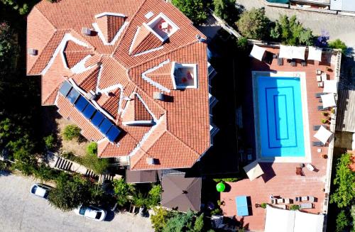 an overhead view of a house with a swimming pool at Villa Anfora in Datca