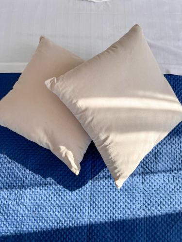 Ένα ή περισσότερα κρεβάτια σε δωμάτιο στο Serenas Guest House
