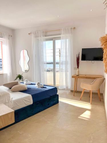 Ένα ή περισσότερα κρεβάτια σε δωμάτιο στο Serenas Guest House