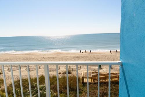 a view of the beach from a balcony at Beach Club at Montego Inn in Myrtle Beach