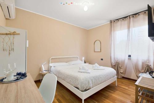Posteľ alebo postele v izbe v ubytovaní La Rosa del Golfo dei Poeti