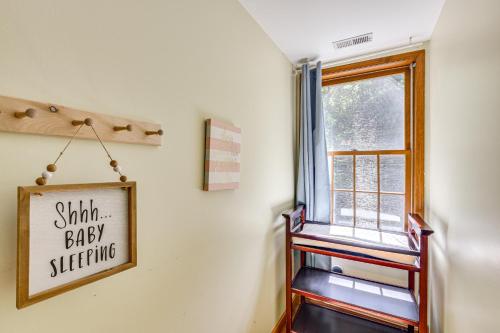 a room with a window and a sign that reads shift baby switching at Huge Family Home with Pool - 13 Mi to Lake Michigan! in LaPorte
