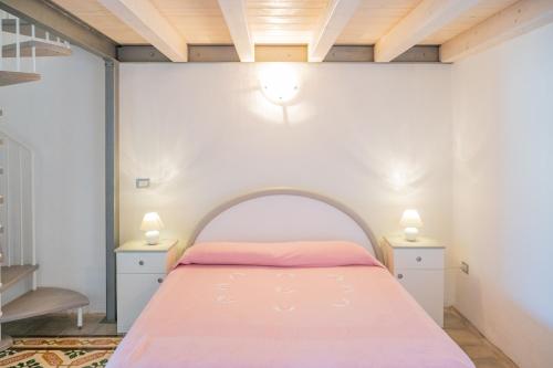 Ένα ή περισσότερα κρεβάτια σε δωμάτιο στο Residenza Il Limone