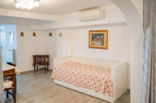 Ένα ή περισσότερα κρεβάτια σε δωμάτιο στο Residenza Il Limone