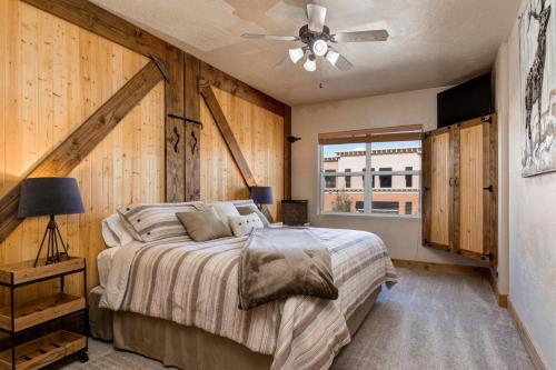 a bedroom with a large bed and a ceiling fan at Foxpoint 1684-H3 by Moose Management in Park City