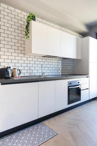 Dapur atau dapur kecil di Portosole Apartments