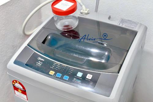 a toaster with a bottle on top of it at Costa Mahkota - 1min I Mahkota Parade Mall I Dataran Pahlawan I Mahkota Hospital in Melaka