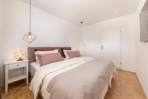 Postel nebo postele na pokoji v ubytování DSE Apartment