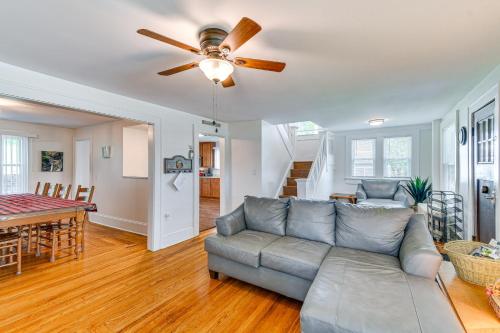 a living room with a couch and a ceiling fan at Montour Falls Home 2 Mi to Seneca Lake and Wineries in Montour Falls
