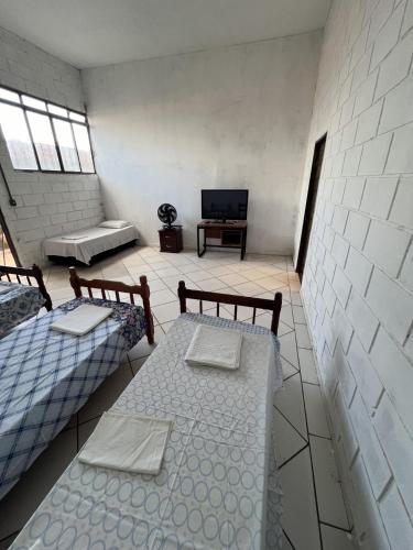 Μια τηλεόραση ή/και κέντρο ψυχαγωγίας στο Apartamentos Itamaraty