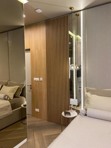 Ένα ή περισσότερα κρεβάτια σε δωμάτιο στο K&K2 Luxury Studios