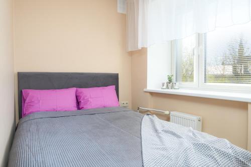 Llit o llits en una habitació de Ernakodu