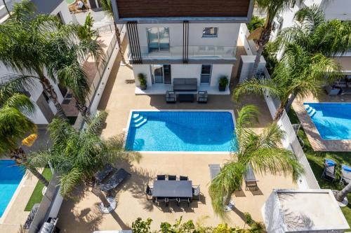 Πισίνα στο ή κοντά στο Valerian Palm Villas - Napa's Secret Escape