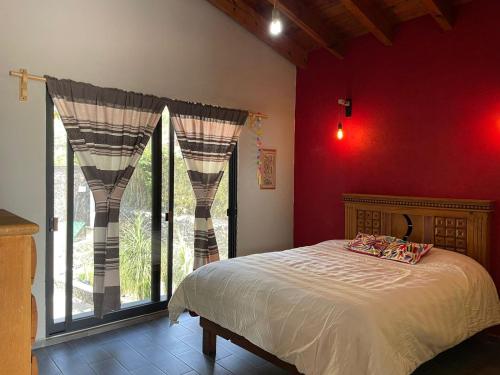 Postel nebo postele na pokoji v ubytování La Casa de los Abuelos