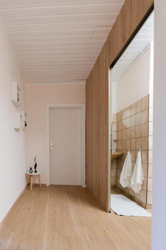 a hallway of a house with a sliding glass door at Ferienhaus Mitzi in Floing