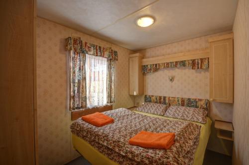 Postel nebo postele na pokoji v ubytování Apartmány Stříbrňák