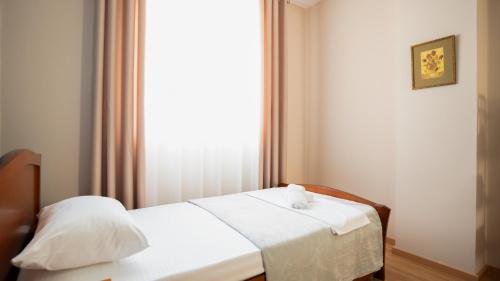 Katil atau katil-katil dalam bilik di Urban Gem Apt - Tirana