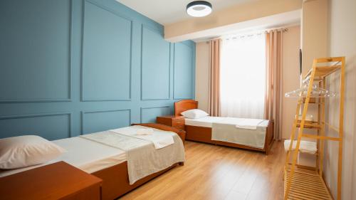Katil atau katil-katil dalam bilik di Urban Gem Apt - Tirana