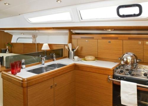 a kitchen with a sink and a stove in a boat at Bed on Boat 36031 corfu in Agios Rokkos