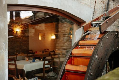a view of a restaurant with a table in a room at Locanda Del Mulino in Maranello