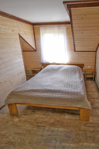 Postel nebo postele na pokoji v ubytování Еміліана