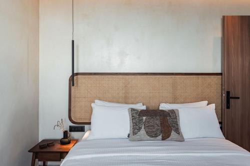 Кровать или кровати в номере Peranosa the Residency
