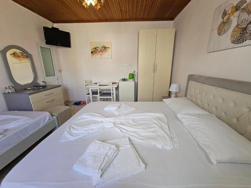 Postel nebo postele na pokoji v ubytování Vila Mulla