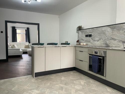 Η κουζίνα ή μικρή κουζίνα στο Slick Space for a Standish Stay