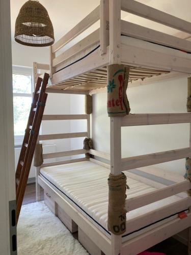 a bunk bed in a room with a bunk bed frame at Landliebe Aulosen in Aulosen