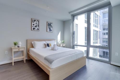 Llit o llits en una habitació de Experience Comfort and Style at Clarendon