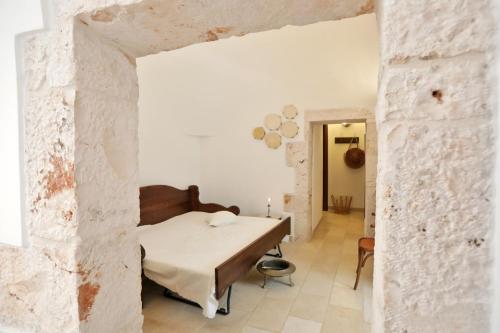 Katil atau katil-katil dalam bilik di Trulli Foggia dell'Albero