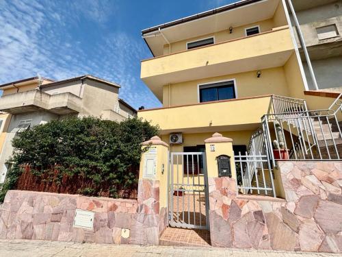a building with a gate in front of it at Bouganville in Olmedo