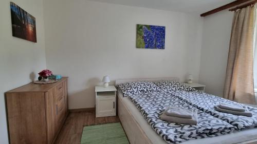 Postel nebo postele na pokoji v ubytování Apartmány Krásné zátiší