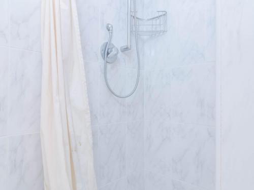 a shower with a shower curtain in a bathroom at Can Nicolau - Villa With Private Pool In Colònia De Sant Pere Free Wifi in Colonia de Sant Pere