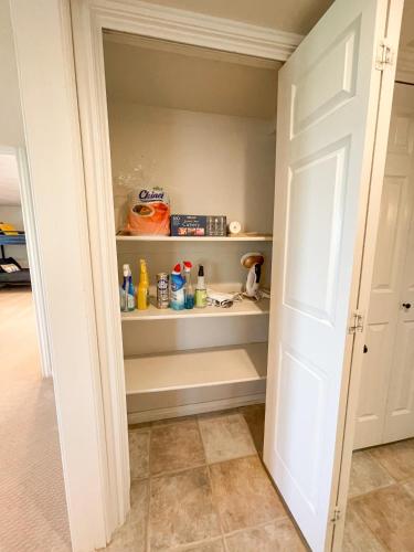 a walk in pantry with the door open at City View Retreat 2 BR 1 B in Draper