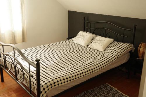 Кровать или кровати в номере Casa Podragu