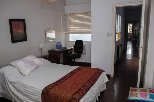 Ένα ή περισσότερα κρεβάτια σε δωμάτιο στο Rent for Days - Casa Centro