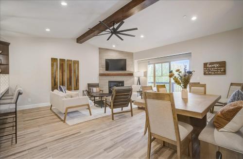 a dining room and living room with a dining table at Black Rock Ridge 14202 by Moose Management in Park City