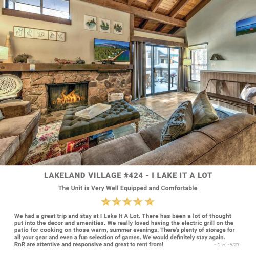 a living room with a couch and a fireplace at Lakeland Village 424 - I Lake It A Lot in South Lake Tahoe