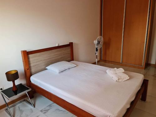 Кровать или кровати в номере Apartamento Gamboa 1